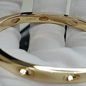 ( Sold )EXCLUSIVE CORUM 18K YELLOW GOLD BANGLE BRAND NEW