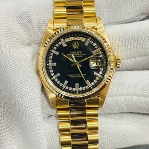 ( Sold) ROLEX DAYDATE 18038 36MM FULL 18K GOLD BLACK STRING DIAL PRE-OWNED WITH ROLEX SERVICE CENTRE CERT